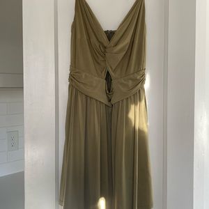 NBD -size small.  Metallic sheen, olive color.  Adjustable straps